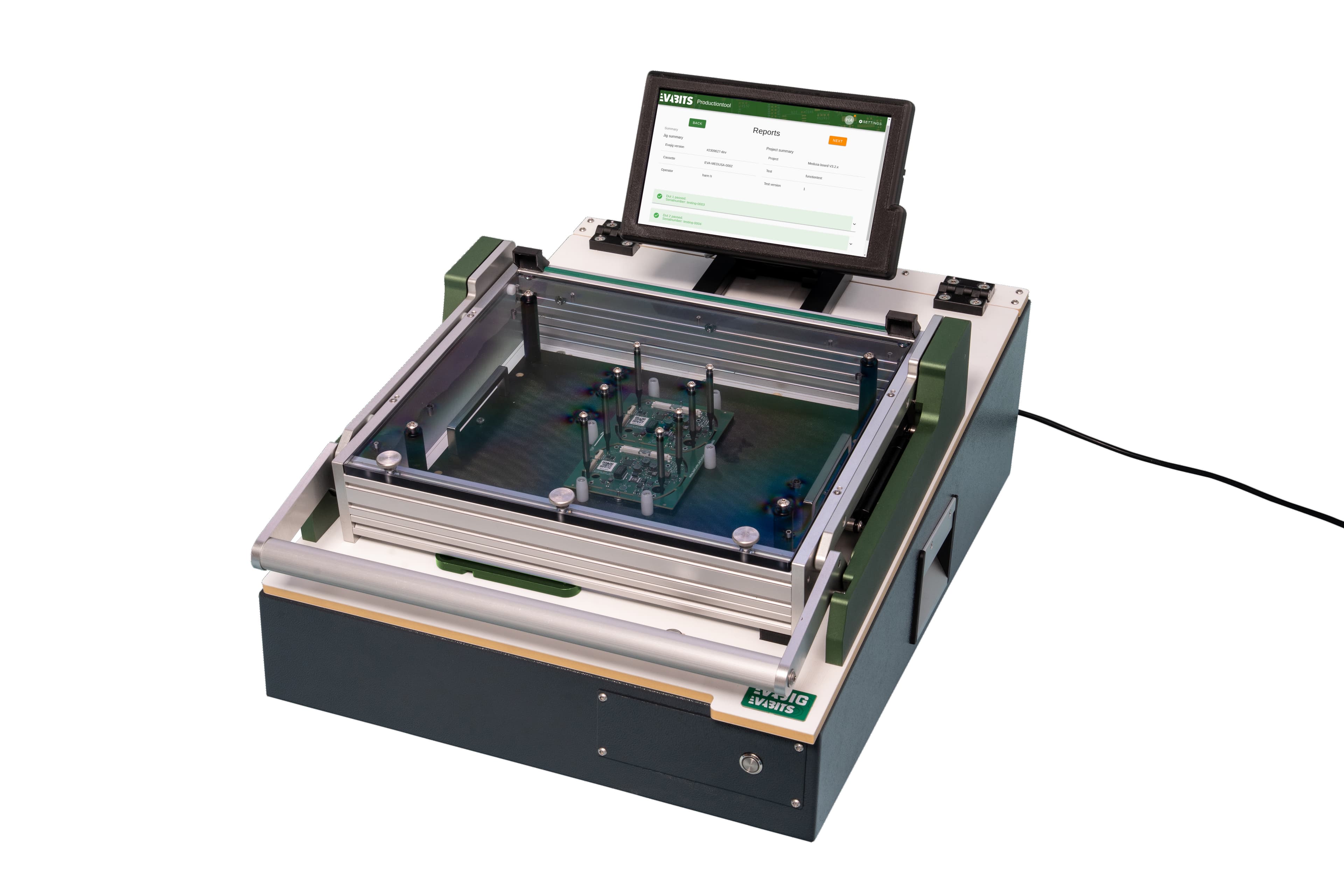 The EVAjig test fixture with its touchscreen showing a test report